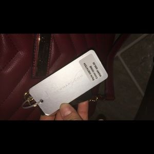 Red, Andrew Marc’s purse